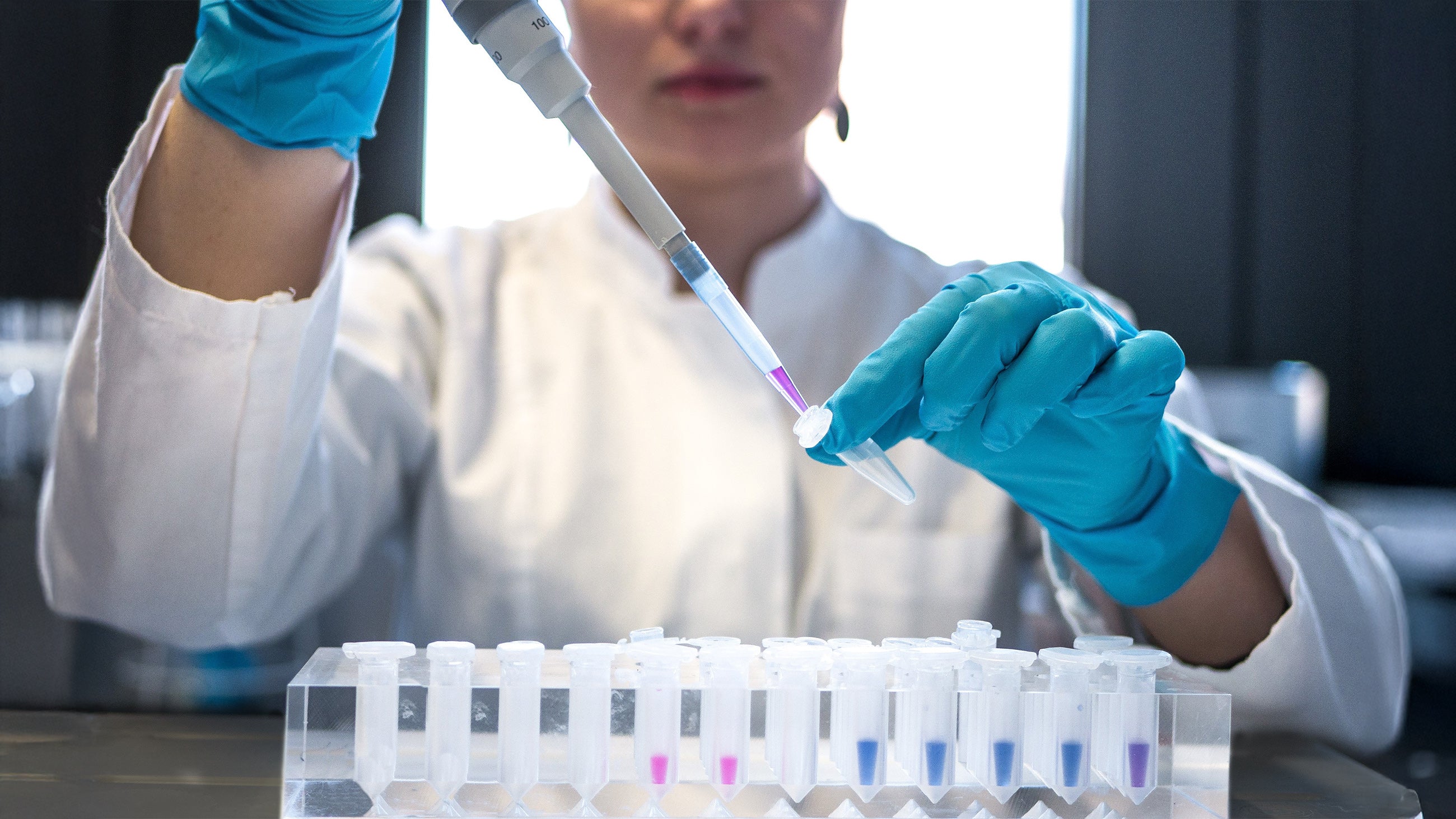 A scientists creates peptides in skincare. Peptides 101: What they are, and how they work to smooth & firm skin