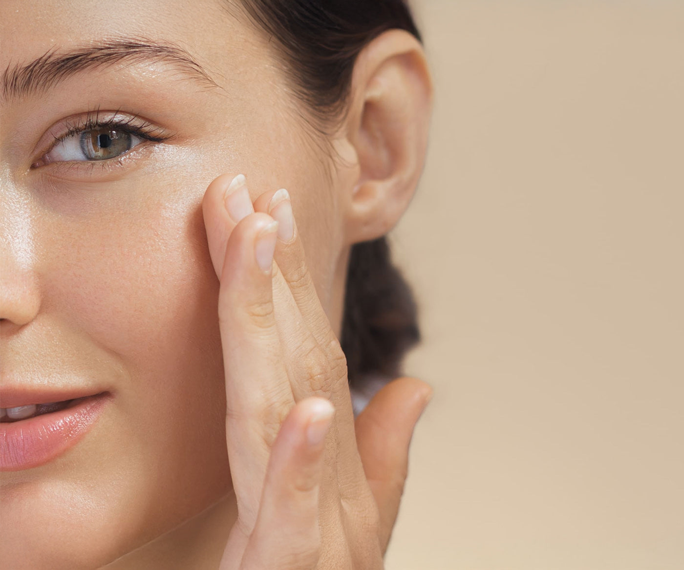 A woman's face is highly nourished and moisturized with Fix Studios medical-grade HydraRenew™ Vitamin-Enriched Hydration Cream