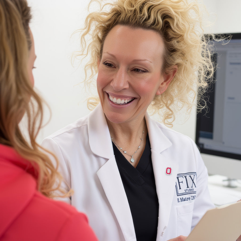 Elizabeth Matre DNP, CNP (aka Dr. Beth Matre) consults a patient for Acne Treatment services fix studios cincinnati mason OH