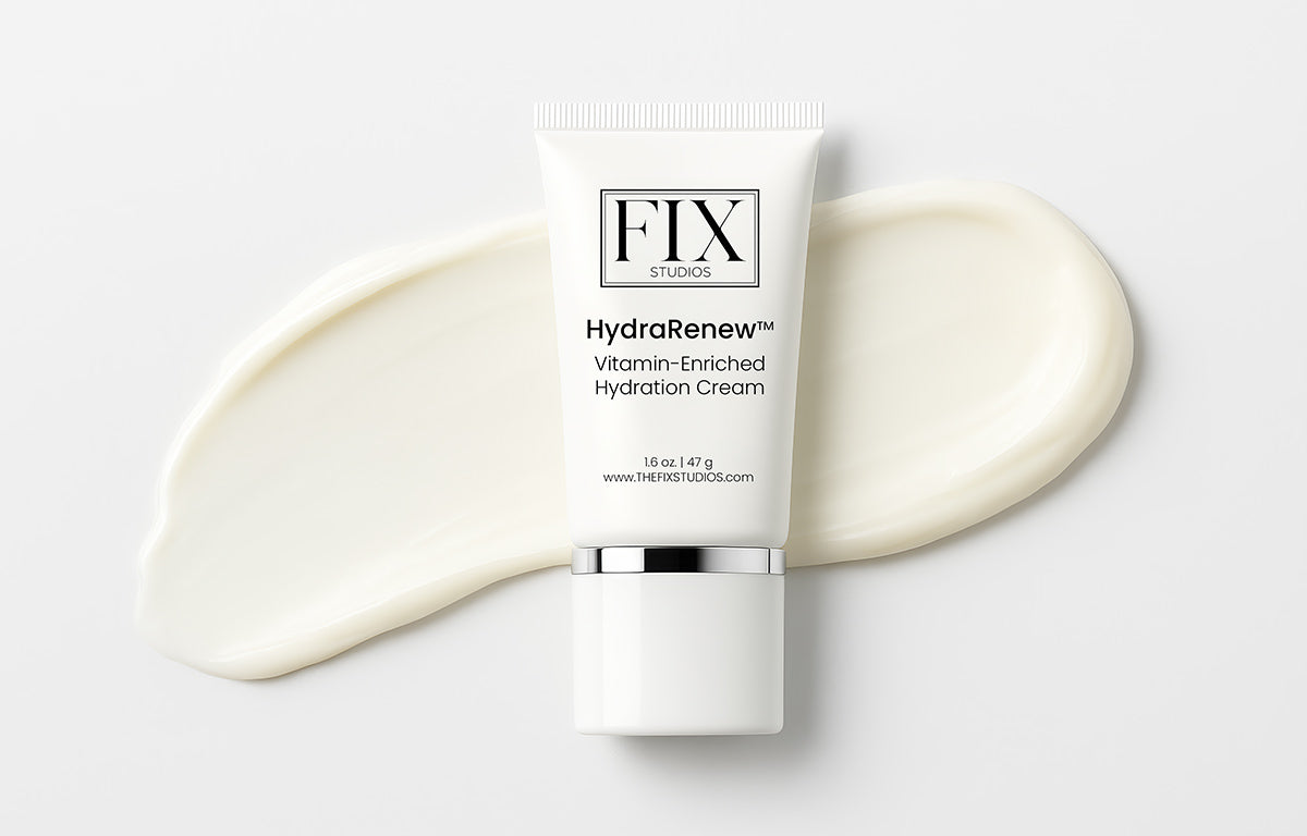 A bottle of Fix Studios medical-grade HydraRenew™ Vitamin-Enriched Hydration Cream rests on top of its rich and non-greasy cream