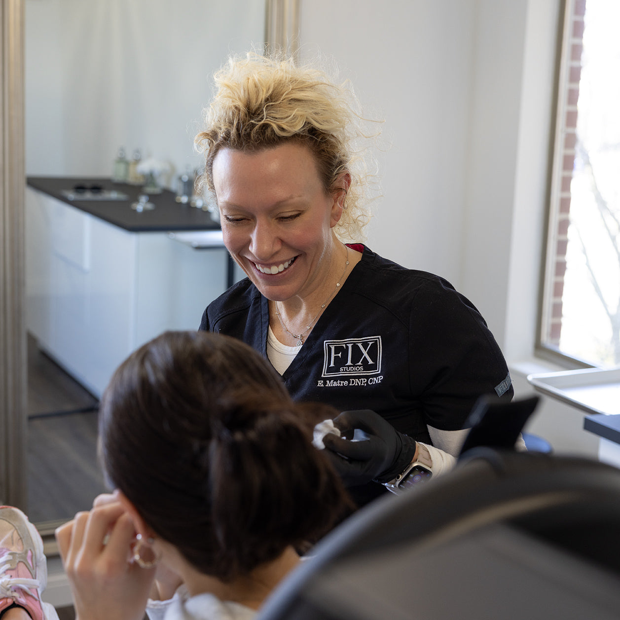Dr. Beth Matre performs treatments