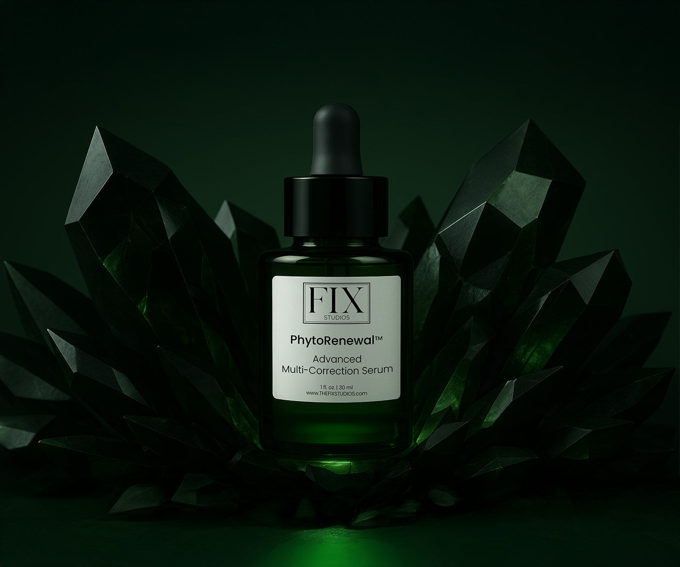A bottle of Fix Studios medical-grade PhytoRenewal™ Advanced Multi-Correction Serum is pictured with emerald crystal shards