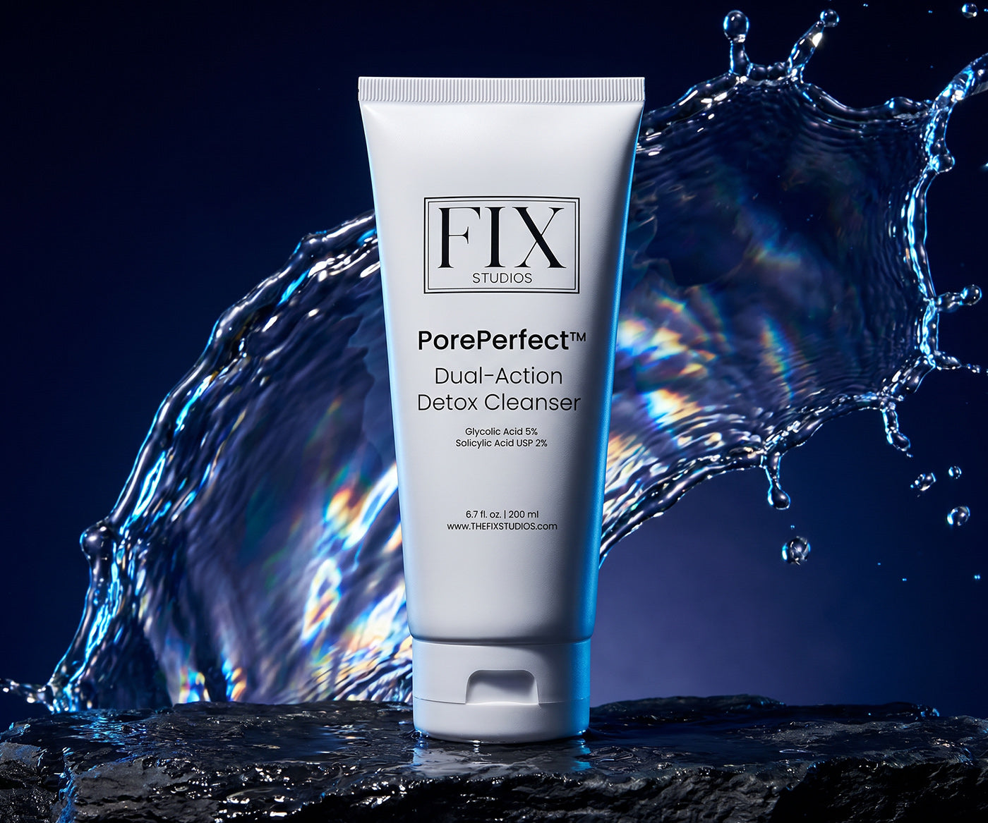 A bottle of  Fix Studios medical-grade PorePerfect™ Dual-Action Detox Cleanser with water splashing in the background