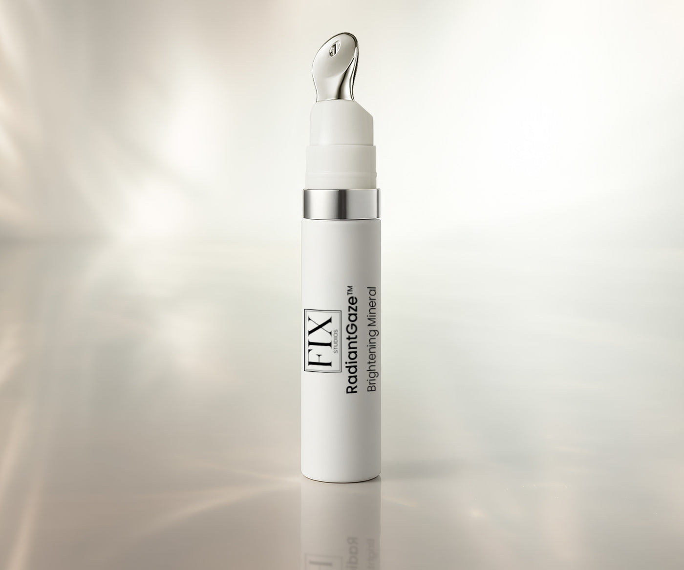 Fix Studios medical-grade RadiantGaze™ Brightening Mineral Eye Defense SPF 50+ captured in glow light rays