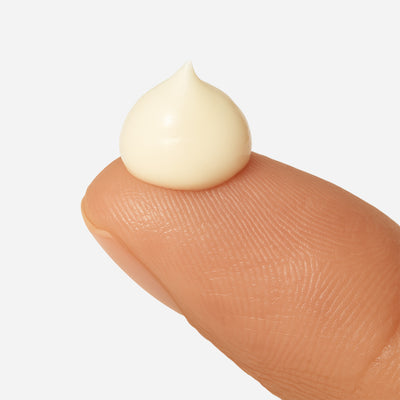 Fix Studios Medical-Grade ReposePM™ Restorative Eye Treatment cream on fingertip