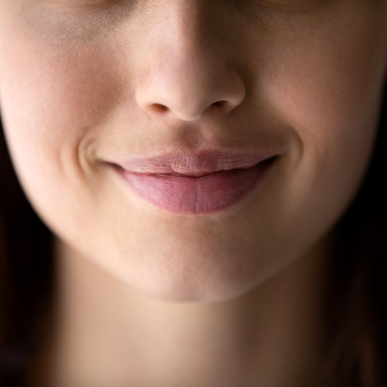 A woman receives dermal lip filler, cheek filler, and jawline filler at Fix Studios Cincinnati Mason OH