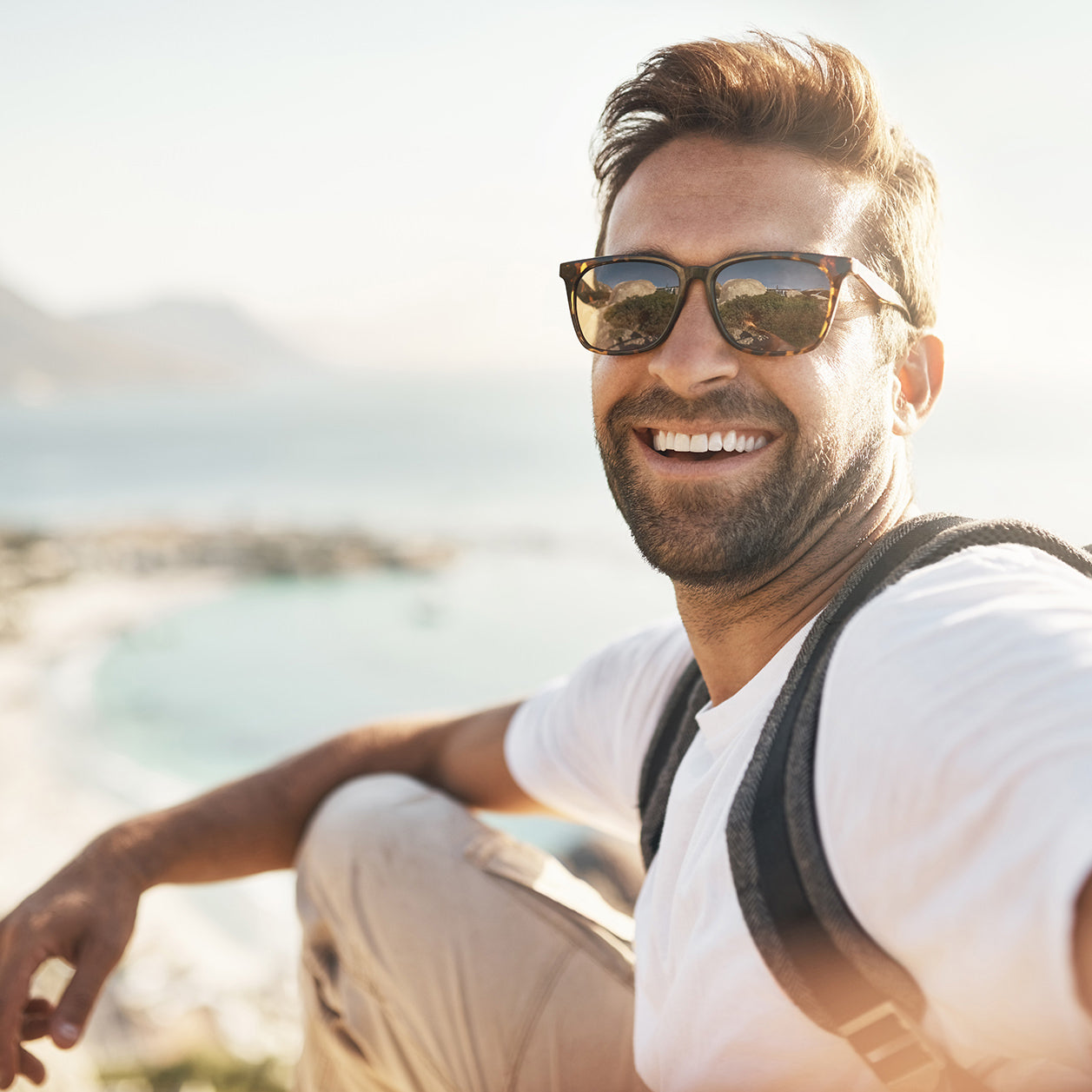 A man takes a selfie on vacation after receiving male aesthetics services at Fix Studios medspa in Cincinnati Mason OH